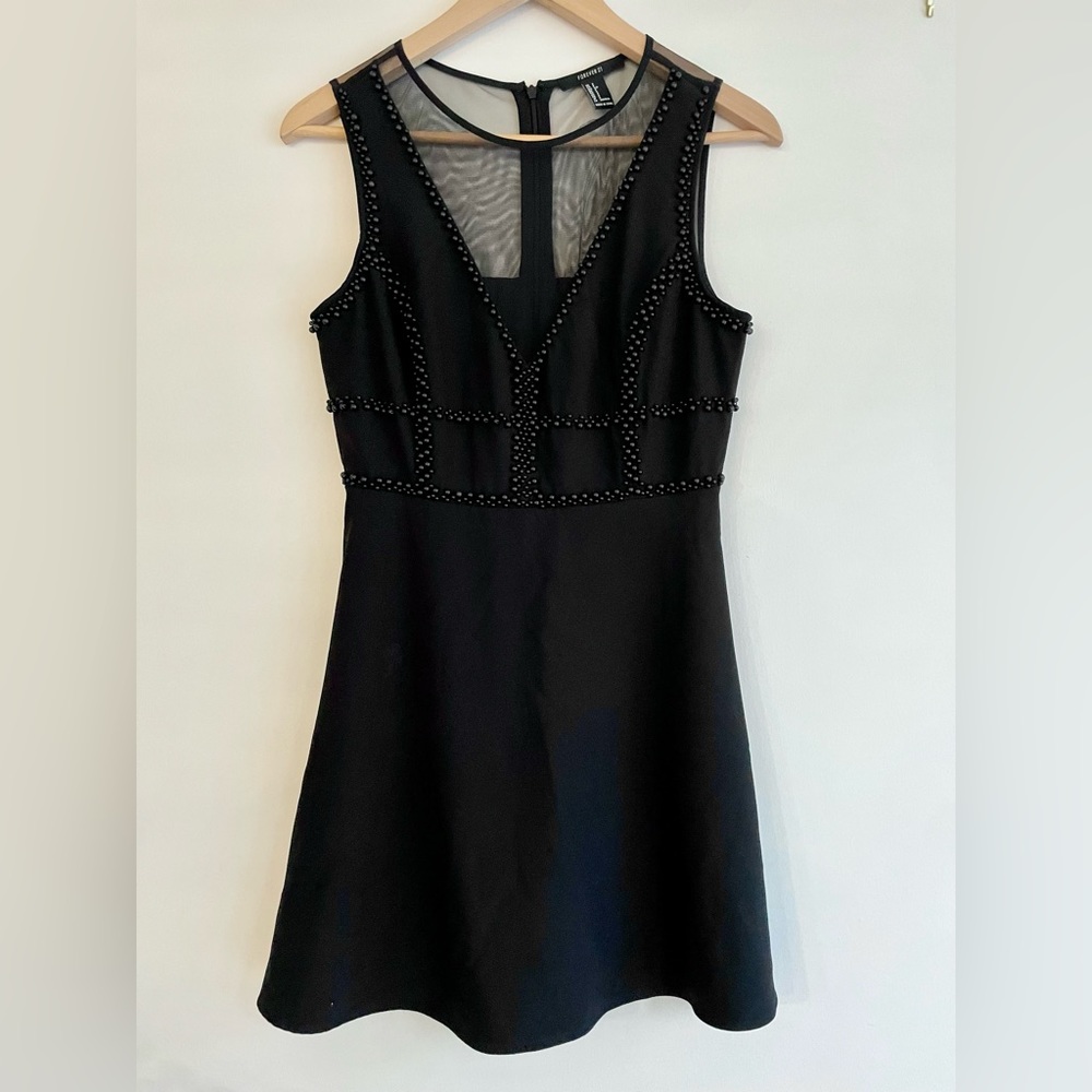 Black minidress with beads details